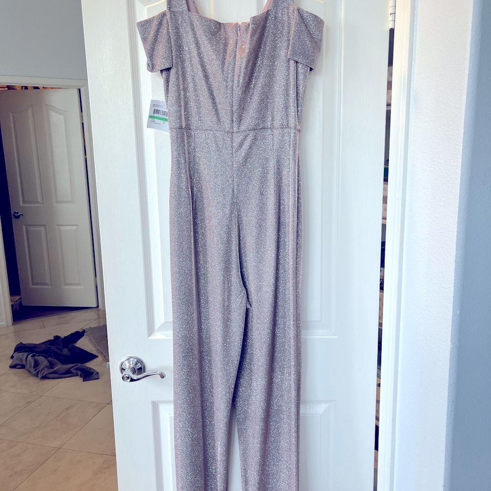Pink, sparkling jump suit